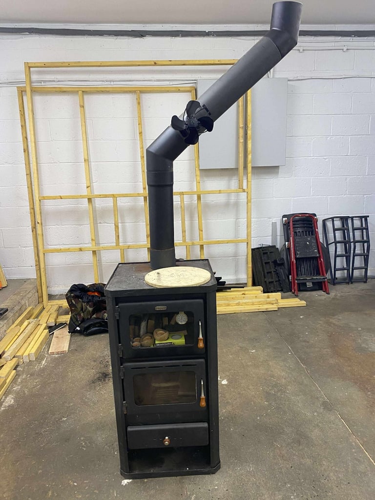 Prity wood burning stove with oven