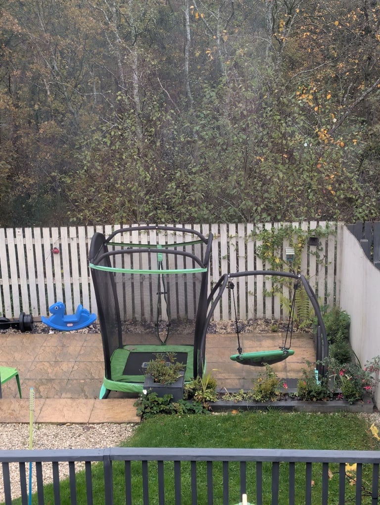 Kids trampoline with side swing