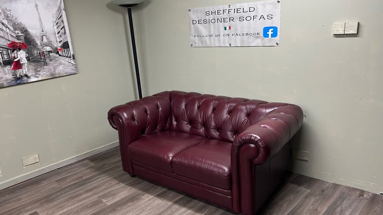 Italian leather chesterfield two seater sofa (delivery available)