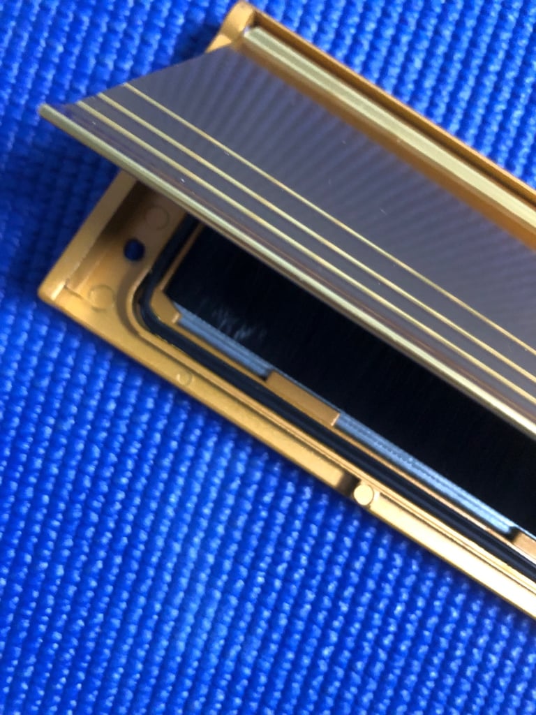 Gold letterbox cover