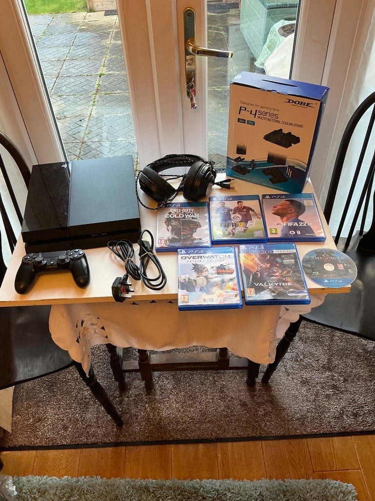 PlayStation 4 console 500GB bundle with kikc gaming headphones and dobe p-4 series cooling stand 
