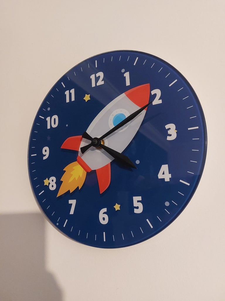 Space theme rocket wall clock