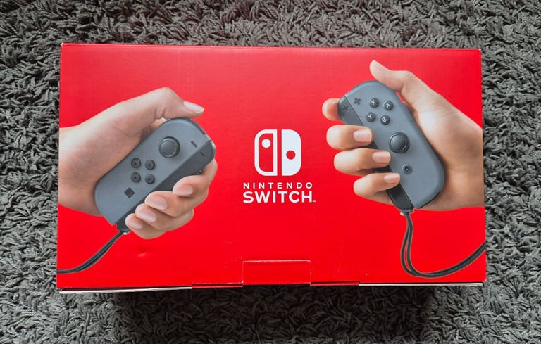 Nintendo Switch Grey with extra controller and 10 games.