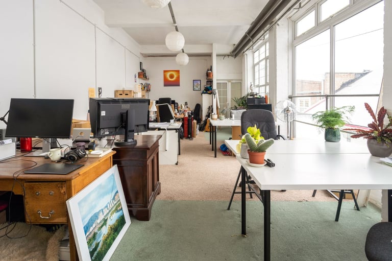 Deskspace in shared artist co-working space