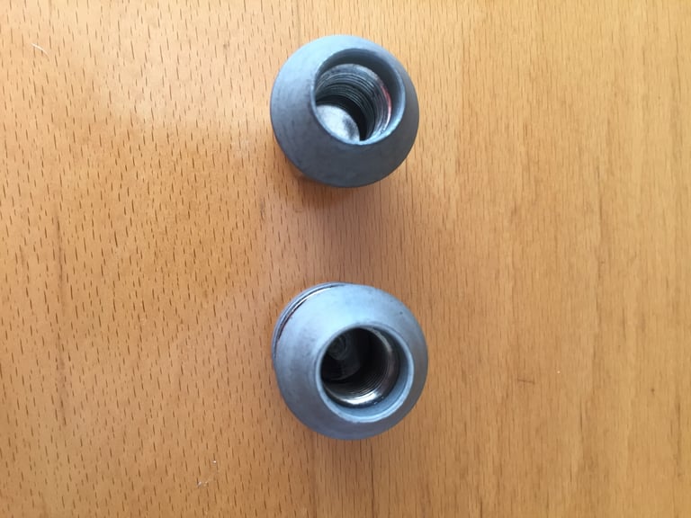 Full silver wheel nut kit including locking nuts and nut key