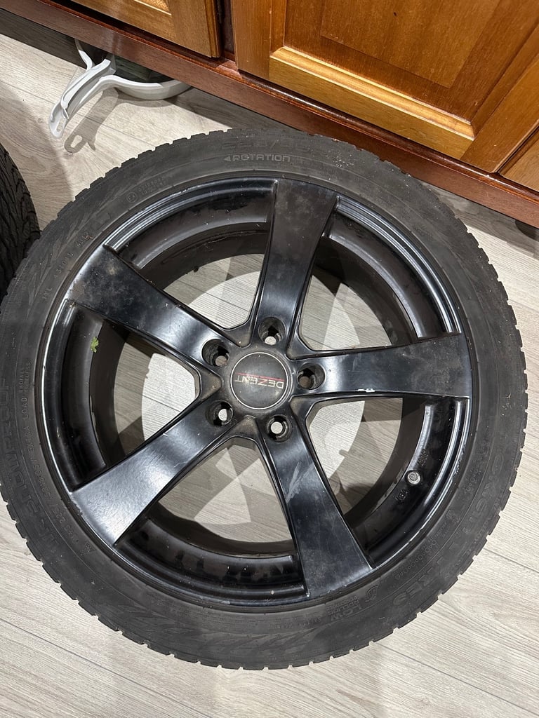 image for 18” black Alloy wheels for BMW with good winter tyres.