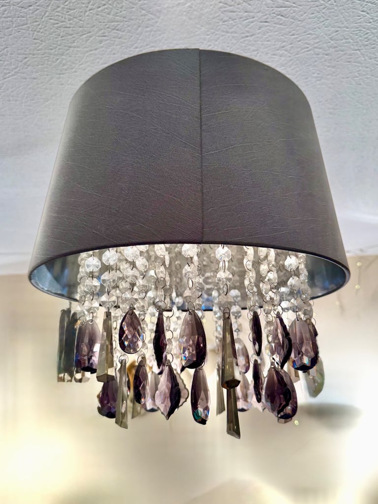 Grey pleated satin shade with drop cristals Measuring 35x 35 cm. Drop crystal plastic 