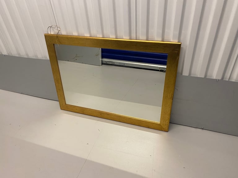 Mirror with gold frame 