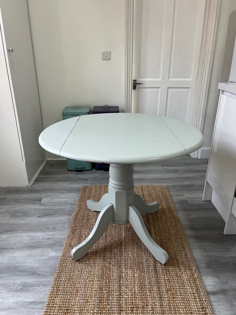 image for Free. Wooden round dining table with folding sides