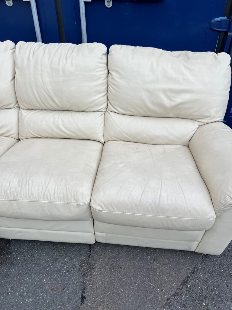 Cream leather corner sofa with recliner 