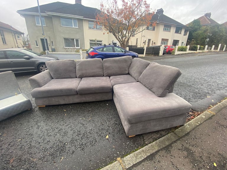 Corner group sofa in a quilted fabric with matching ottoman footstool   Only £199