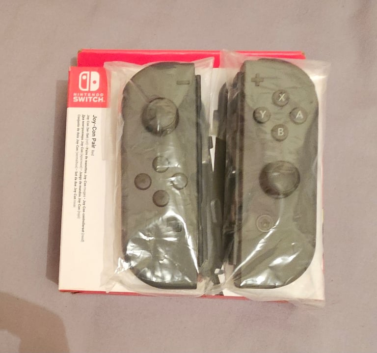 image for Brand New Sealed Nintendo Switch Joy Cons (Grey)