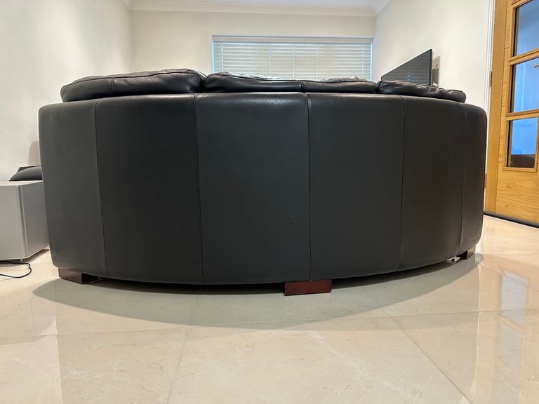 BLACK LEATHER SOFAS + FOOTSTOOL