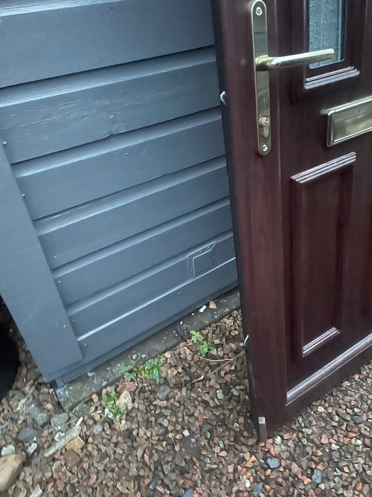 Upvc front door in rosewood 