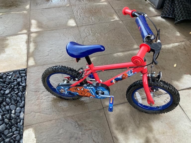 image for SPIDER-MAN BIKE FOR 4 to 7 year old. GOOD COND. GREAT CHRISTMAS PRESENT