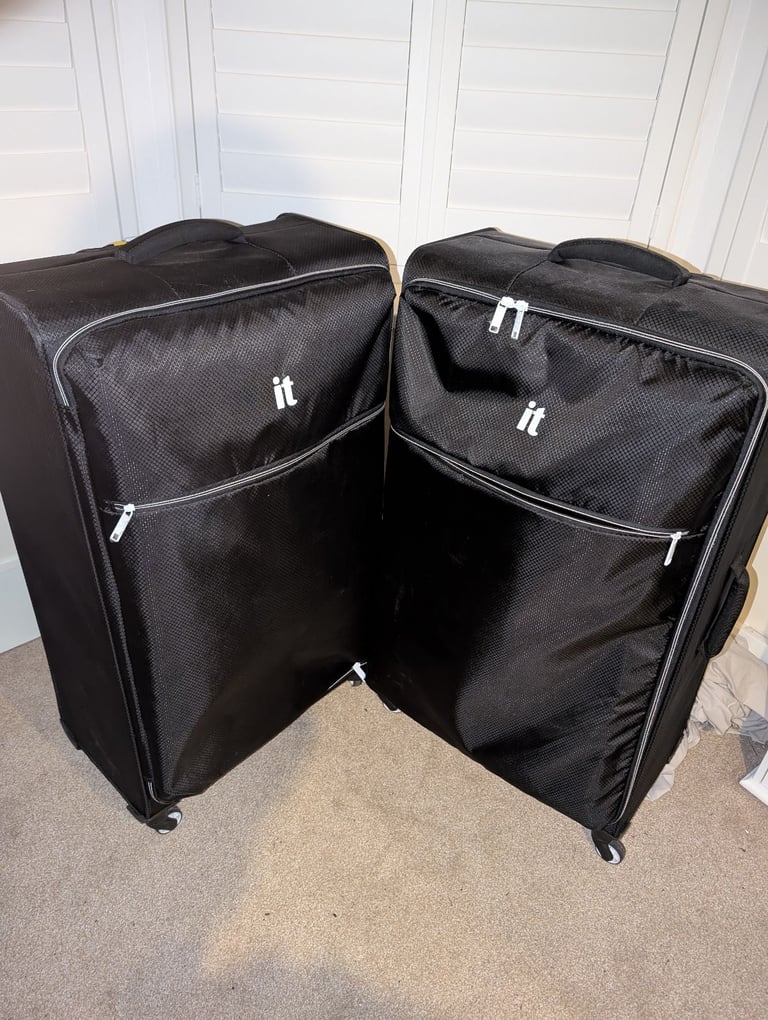 2 Ex Large Suitcases 
