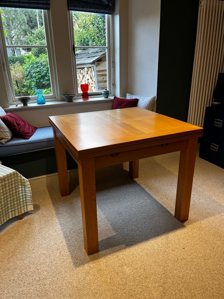 image for Solid oak extending dining table 