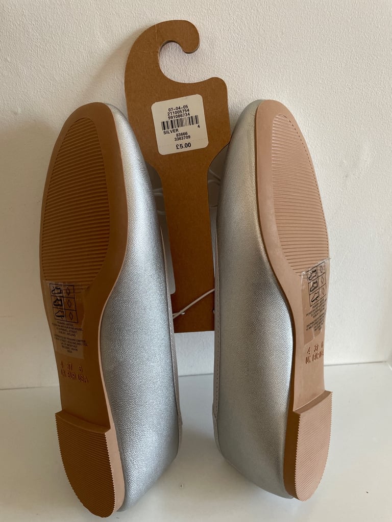 Silver Pumps.  Size 4