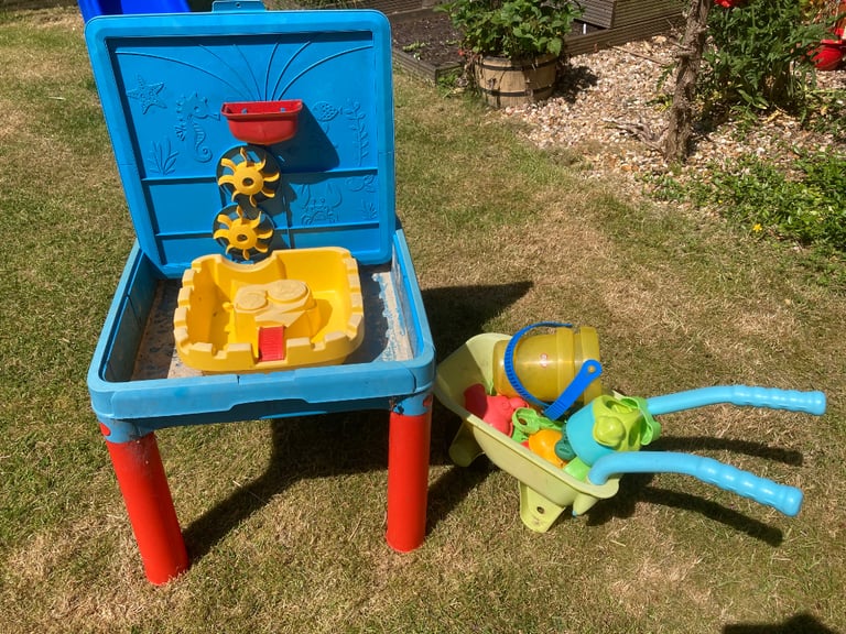 Kids sand / water table and wheel barrow