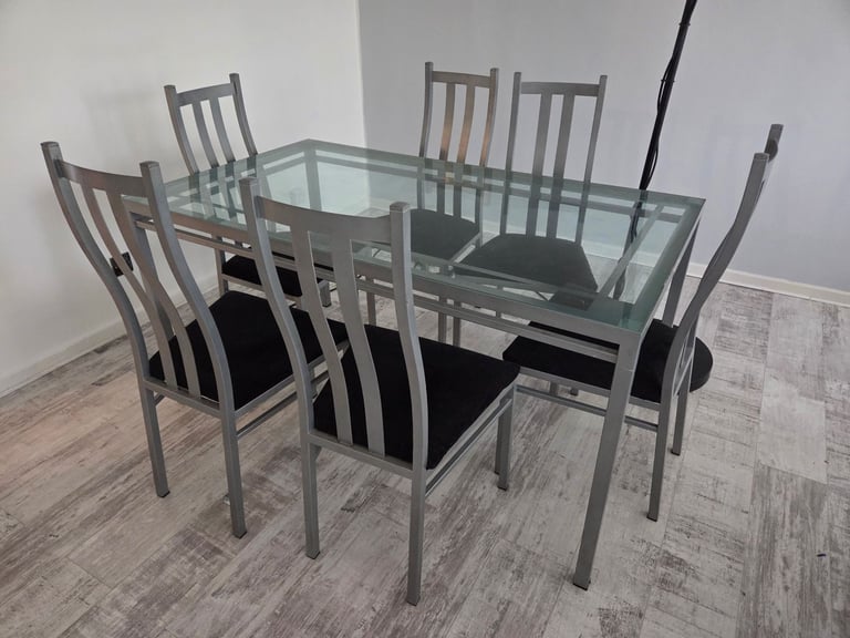 image for Glass dining table and chairs