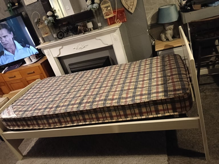 White wooden single bed and mattress 