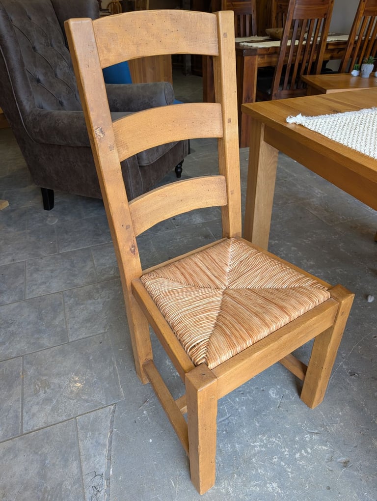 Solid oak dining table and chairs 