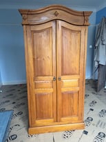 Wooden shelved cupboard
