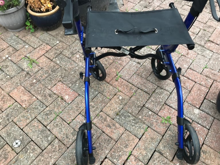 4 wheeled walking aid and seat