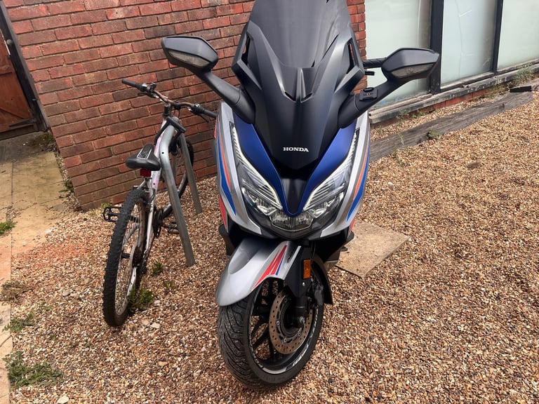 image for For Sale: Honda Forza 125cc - Stylish, Reliable, and Practical!