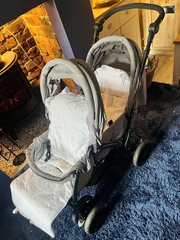 Gray twin pram for 25  and 2 PS4 games both 10 and brand new and dog or child sofa 55 
