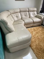 Cream leather corner sofa with recliner 