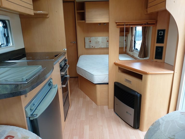 NOW SOLD 2010 Bailey Olympus 534 Fixed Bed End Washroom Caravan Motor Mover