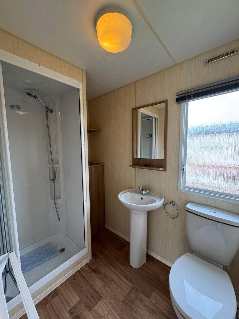 Cheap sited static caravan for sale North Wales - family run park low site fees