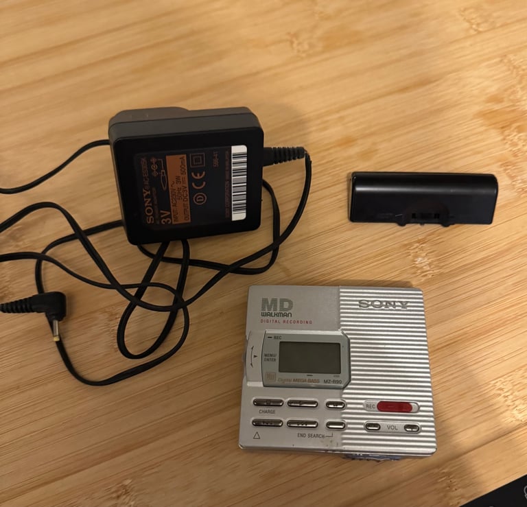 image for Sony MD Walkman minidisc player MZ-R90 with charger and AA battery cradle.