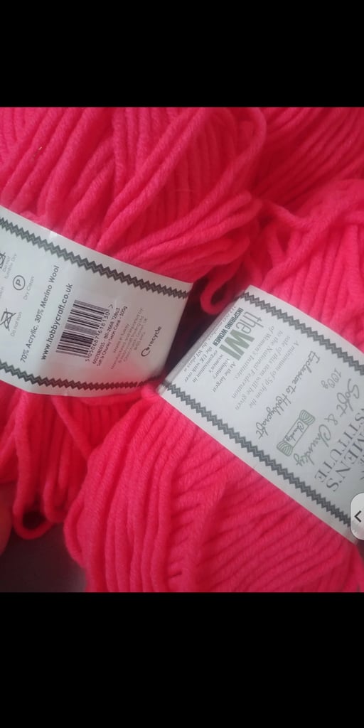 Large neon pink yarn bundle.