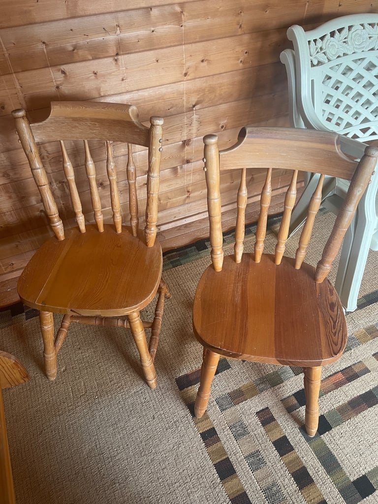 pine dinning table and two chairs
