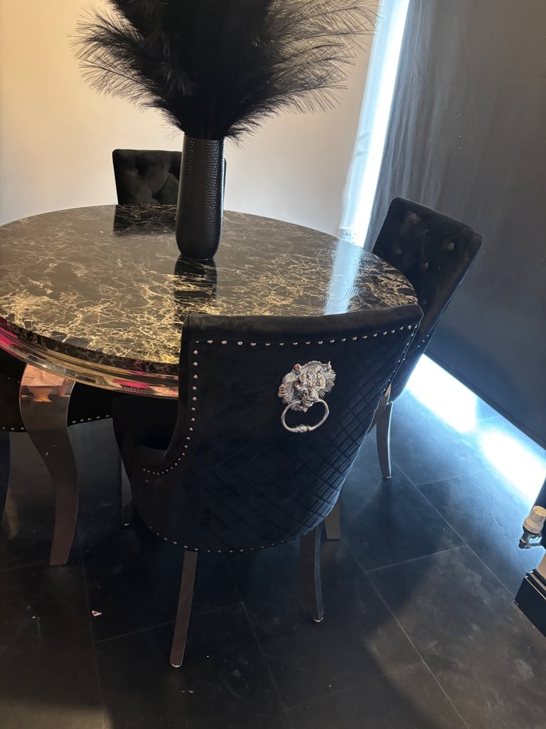 Black marble dinning table and chairs 