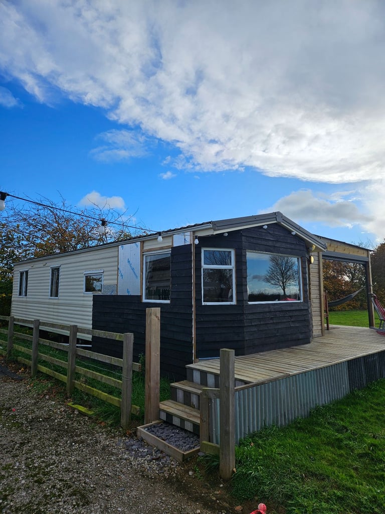 Static caravan with timber structure