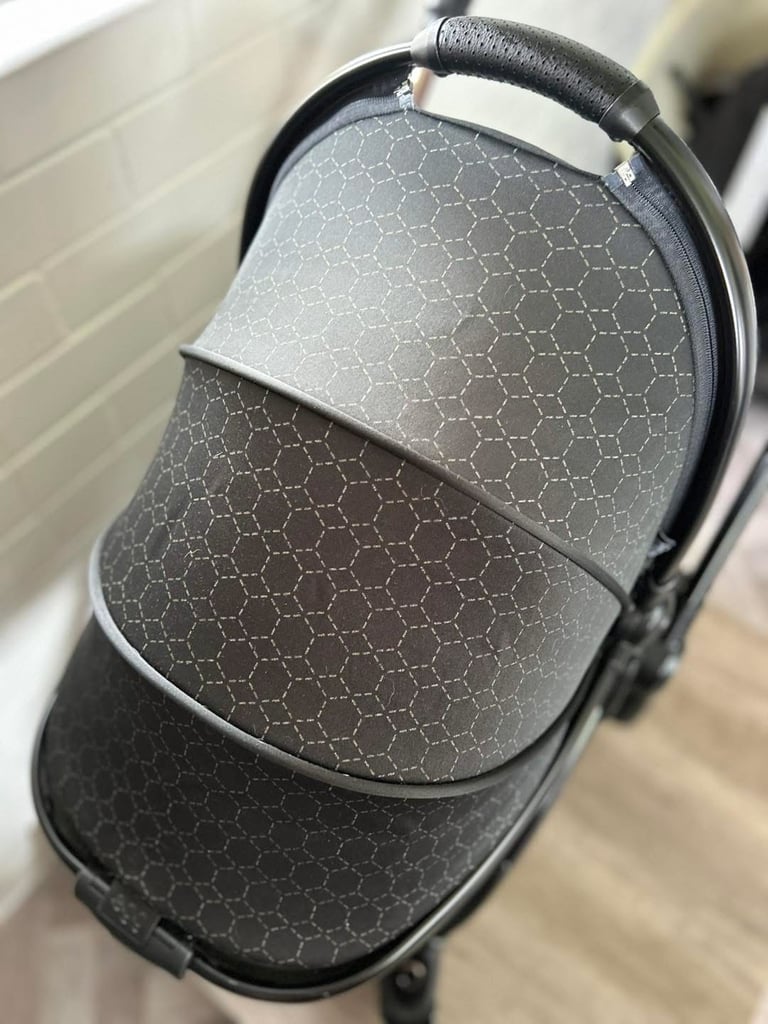 Egg2 Luxury pushchair and Shell I-size car seat special edition bundle in black Geo