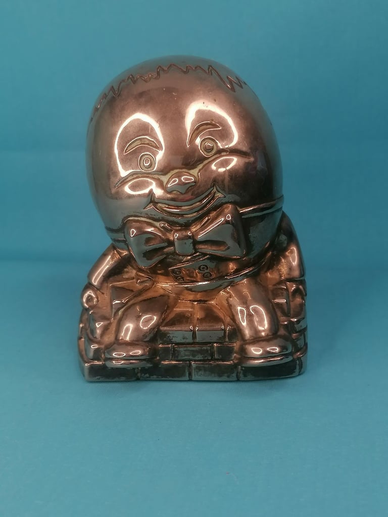 Vintage Humpty Dumpty Silver Plated Metal Coin Bank Money Box.. Missing one part.