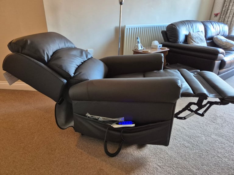 Careco electric riser/recliner brown leather chair 