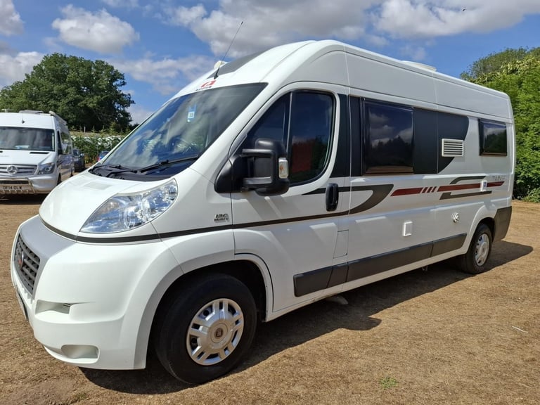 Adria Twin SF. 2013. Rear French Bed. Half dinette hosts 5.