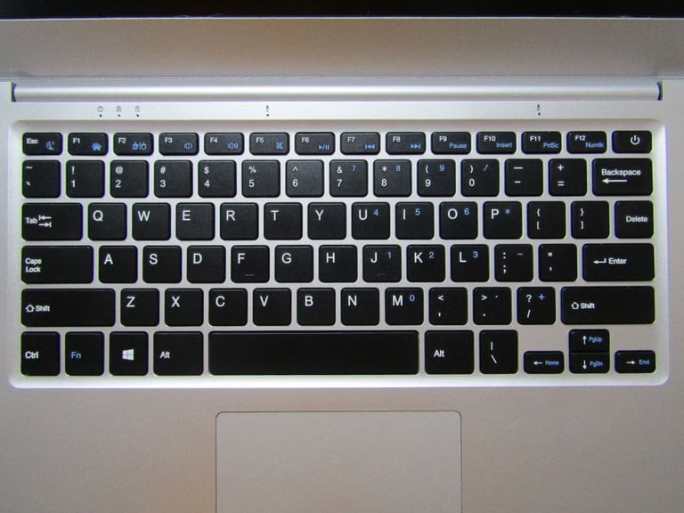 silver JOOMPER 14inch laptop tools in good condition lightly used 64GB own charger