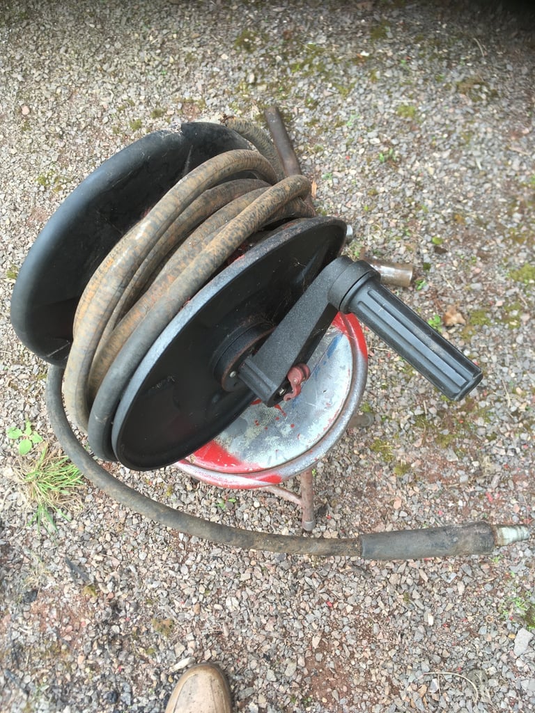 Hydraulic driven pressure washer pump and hose. Real