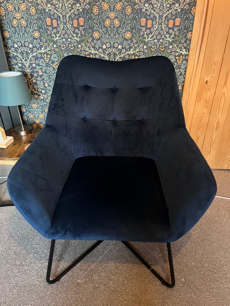 Blue velvet armchair