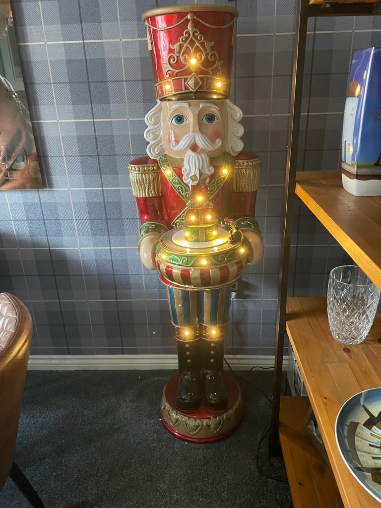 Large Christmas nutcracker 5ft tall lights up and plays music. Like new