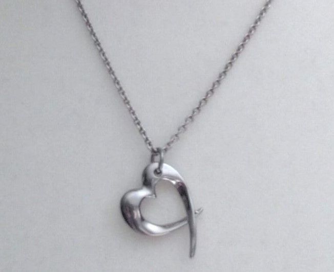 image for New Silver Toned Necklace with Heart Pendant.POST OT COLLECT!