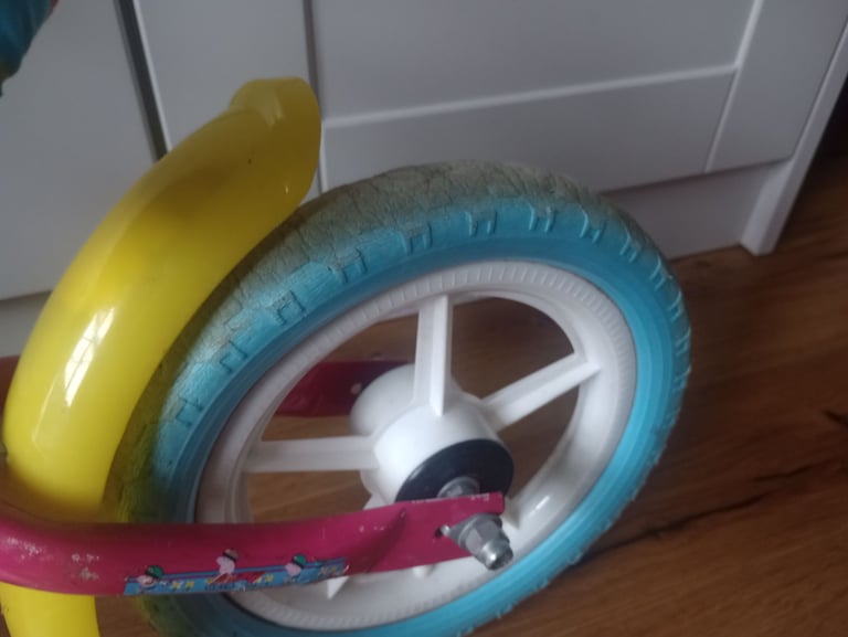 image for Peppa pig balancing bike and helmet 