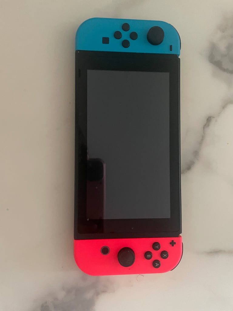 image for 🎮 Nintendo Switch Console – Neon Red & Blue Joy-Cons – Excellent Condition
