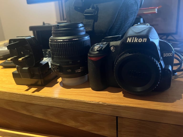Nikon D3100 DSLR + 18-55mm VR Lens + Charger + Bag